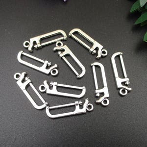 20Pcs 26x7mm Silver Hacksaw Charms-p1736