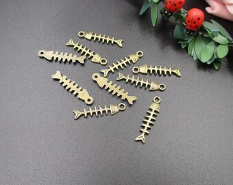 20 dijes de espina de pescado de bronce de 23 x 5 mm - p2061