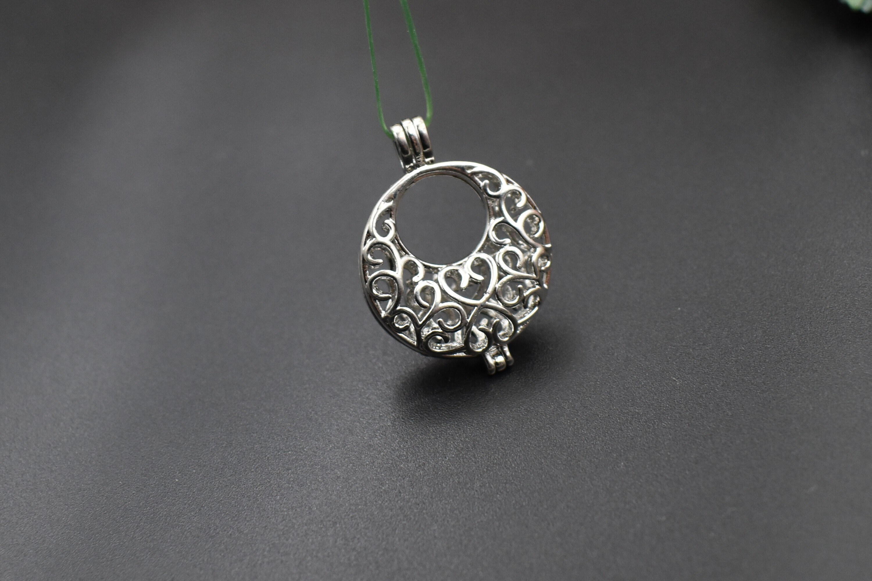 ペンダント２つ 即日発送］SV925 メビウスの輪 ペアネックレス【P029】 – Better