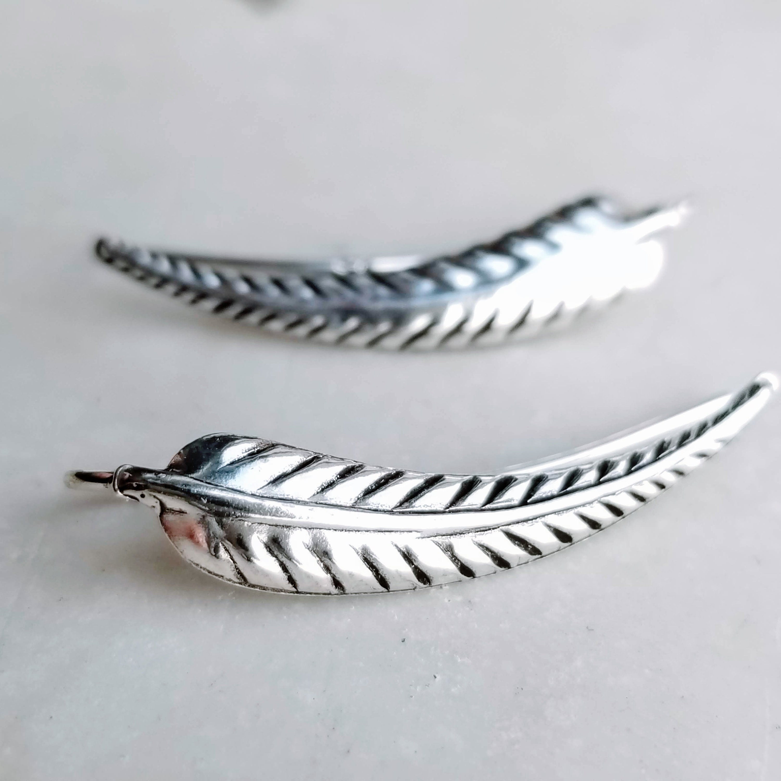 Feather crawler earrings shop