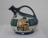 Art deco period pitcher by Amphora of Teplitz-Turn in Bohemia Czechoslovakia. Egyptian figures in sgrafitto design