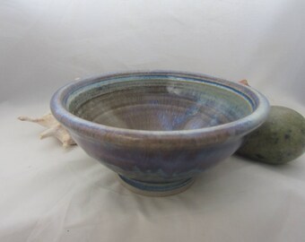 Studio pottery bowl with lovely drip glaze decor.