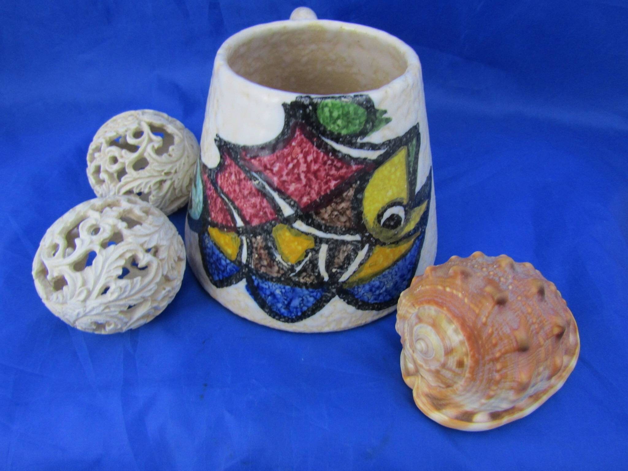 Large mug or tankard in volcanic spatter glaze with bold hand-painted abstract fish decoration Possibly Vallauris