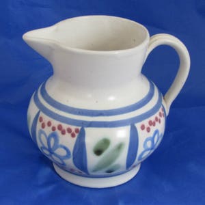 Buchan pottery jug 1960s stoneware jug in white with bold pattern in blue, green and red by Buchan Pottery of Portobello, Scotland.