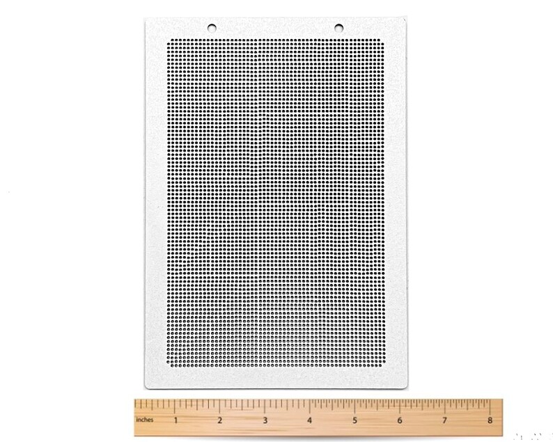 May include: A white metal sheet with a grid pattern of small holes. The sheet is 8 inches wide and measures 6 inches in height.