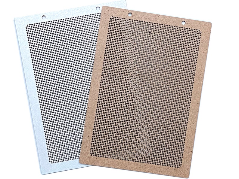 May include: Two rectangular pieces of perforated cardboard, one white and one brown, with holes in a grid pattern.