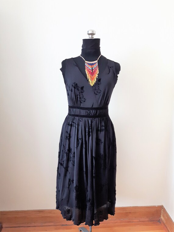 below the knee black dress
