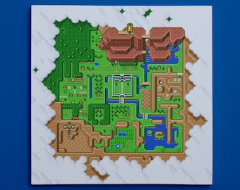 May include: A square wall art piece featuring a pixel art map of a fantasy landscape. The map displays green forests, brown rocky mountains, blue rivers, and a central castle structure, all surrounded by a border of white clouds on a blue background.