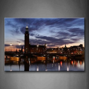 Clouded Sky Various Buildings In Stockholm - Print On Canvas