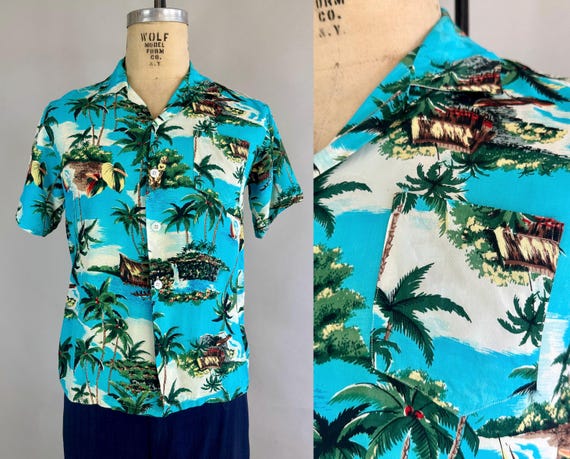 1950s Palm Tree Paradise Shirt | Vintage 50s Blue Rayon Hawaiian Tiki Short Sleeve Button Up Island Life Anthurium Flower Print Top | Medium