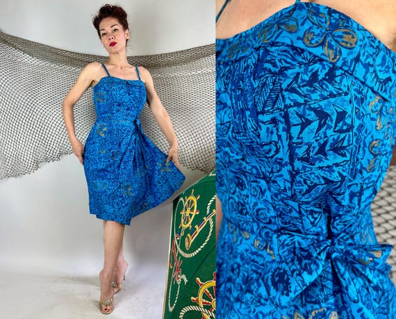 1950s Too Hot Hibiscus Dress | Vintage 50s Blue Black and Gold Floral Tiki Cotton Hawaiian Sun Sarong Frock with Side Ties | Small Medium