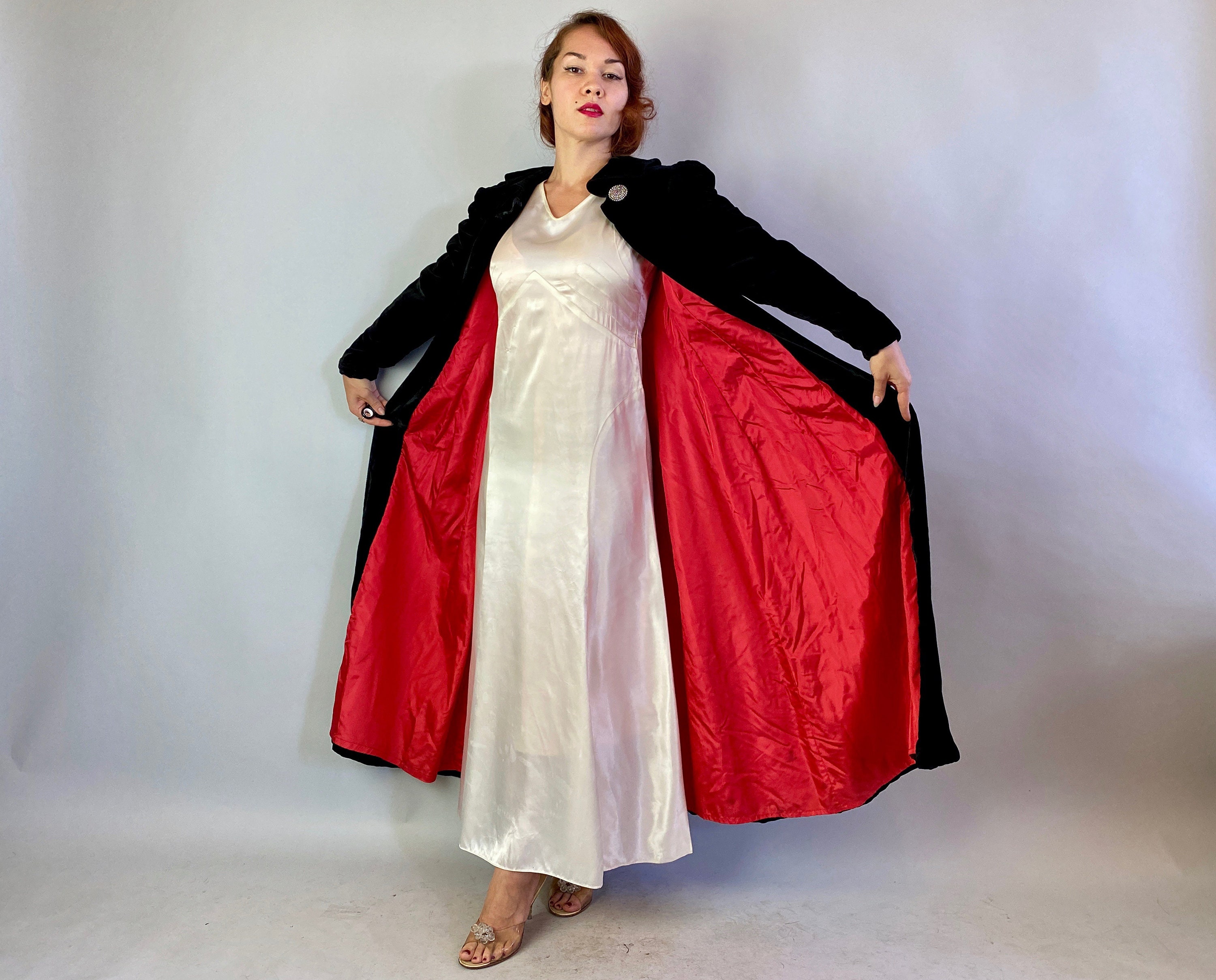 Black coat with red best sale lining