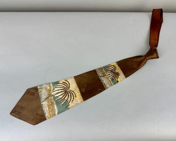 1940s Palm Paradise Necktie | Vintage 40s Brown Blue Yellow and White Volcano Sand and Palms Scenic Stripes Rayon Self Tie Cravat