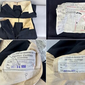 May include: Two pairs of dark navy trousers with cream-colored interior waistbands and button fly closures. Each pair features a white label reading Tailored to Measure by Gentry Clothes for Mr. C. Goertz, dated Oct 24 1939, and a detailed instruction sheet.