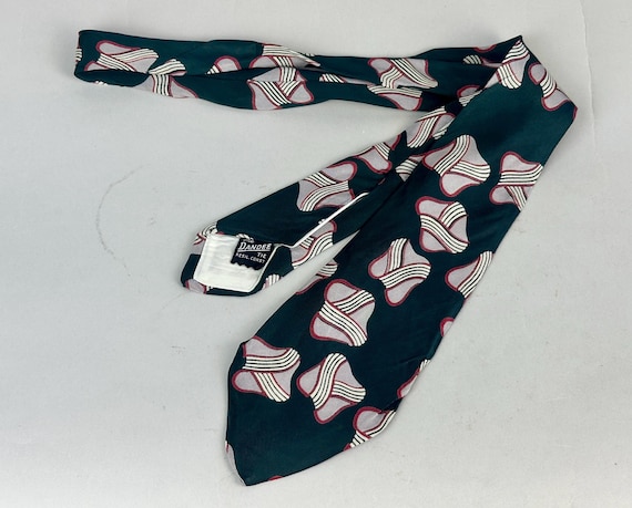 1940s "The Dandee" Candy Necktie | Vintage 40s Deep Teal Blue Grey White and Red Wrapped Tablets Print Silk Self Tie Cravat