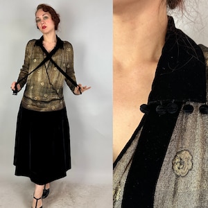 May include: A vintage-style dress with a gold and black pattern. The dress has a black velvet collar and a black velvet skirt. The dress is made of a sheer fabric.