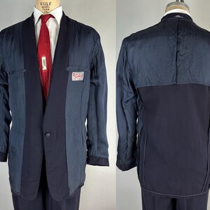 May include: A rustic wooden sign with the text "Welcome to our home" in white lettering. The sign features a distressed finish and a simple, inviting design, perfect for front door decor.