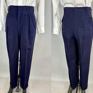 May include: A set of three ceramic mugs with a speckled, matte finish. The mugs are in shades of cream, light gray, and dark gray. Each mug has a simple, minimalist design, perfect for coffee or tea.