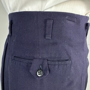 May include: A rustic wooden sign with the text "Welcome to our home" in white lettering. The sign features a distressed finish and a simple, inviting design, perfect for a front porch or entryway.