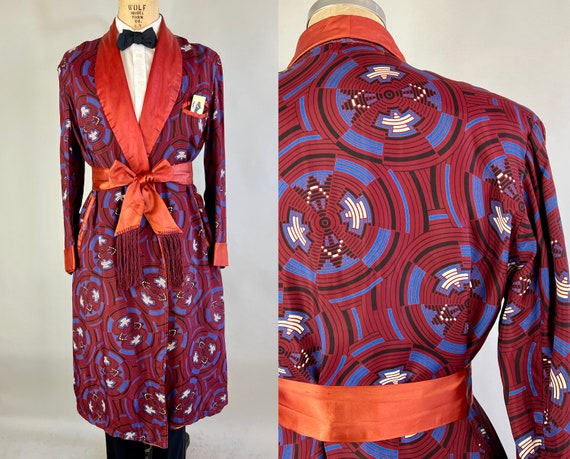 1940s Streamline Moderne Robe | Vintage 40s Burgundy Red Concentric Alarm Circles Rayon Smoking Jacket w/ Satin Fringe Sash Belt | Large/XL