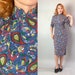 1940s Novelty Print Cheongsam | Vintage 40s Blue Red Green White and Yellow Cold Rayon Paisley QiPao Dress with Elbow Length Sleeves | Small 