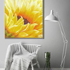 May include: Close-up painting of a sunflower with yellow petals and a brown center. The painting is signed "Miss Lauren" in the bottom right corner.