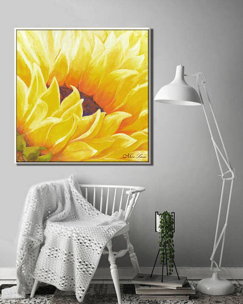 May include: Close-up painting of a sunflower with yellow petals and a brown center. The painting is signed "Miss Lauren" in the bottom right corner.