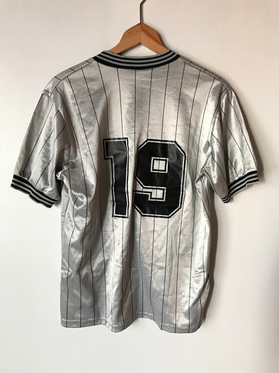 silver soccer jersey