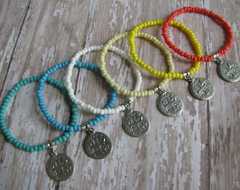 Elastic Assorted Neutral Colors Avail. Czech Seed Bead and Rustic Antique Silver 2-Sided Replica Spanish Coin Cross Charm Bracelet