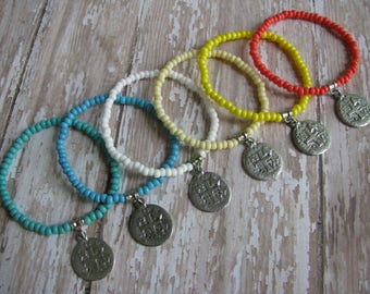 Elastic Assorted Neutral Colors Avail. Czech Seed Bead and Rustic Antique Silver 2-Sided Replica Spanish Coin Cross Charm Bracelet