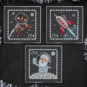 Patrones de punto de cruz de sellos postales de Navidad en el espacio