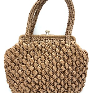 Bolso vintage de rafia marrón con asa superior, años 60