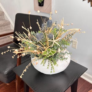 Nautical Floral Centerpiece: Artificial Coastal Flower Arrangement in Seashell Vase
