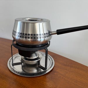 May include: A rustic wooden sign with the text "Welcome to our home" in a handwritten style. The sign is rectangular, with a distressed finish, and features a simple, inviting design. It's suitable for indoor or outdoor use.