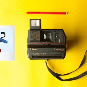 Cámara de película instantánea Polaroid Impulse con autoenfoque AF