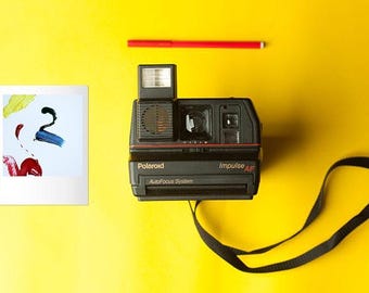 Cámara de película instantánea Polaroid Impulse con autoenfoque AF
