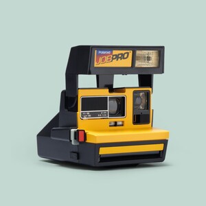 Polaroid 600 job pro camera instant film 600 type camera yellow and black vintage polaroid camera polaroid 600