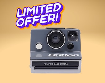 Vintage polaroid land camera with red button, classic instant film camera, retro polaroid 600 series, fully refurbished, collectible camera
