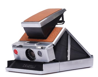 Rebajas de primavera: cámara instantánea Polaroid SX-70, años 70, piel original vintage, marrón y plateada.