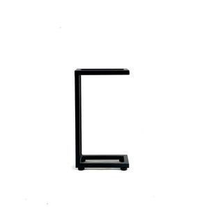 May include: A black, minimalist side table with a rectangular top and base, connected by a vertical support. The table is made of metal and has a matte finish. The design is modern and simple, suitable for various interior styles.
