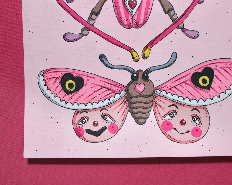 May include: A pink and white butterfly with a heart-shaped design on its wings. The butterfly has a cartoon-like face with large eyes and a smile. The butterfly is on a pink background.