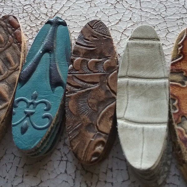 30 Oval die cuts 2.5 X .75 inch, 5 patterns 6 each pattern. Embossed leather. Greatfor leather earrings , jewelry  etc