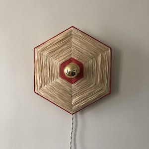 Lámpara de pared portátil JOYA fabricada con fibras naturales