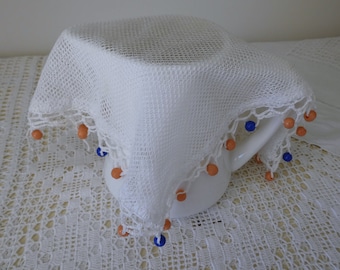Vintage white mesh jug cover with pink and blue beads