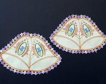 Vintage pair of embroidered linen bell shaped doilies