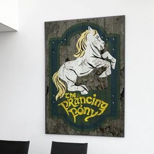 May include: A vintage-style sign with a distressed wood background featuring a white horse with a golden mane and tail. The sign reads "The Prancing Pony" in a stylized yellow font.