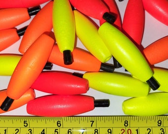 24 of the 2 inch Styrofoam Cigar Shaped Peg Fishing Floats. 2" inch length, Choose Bright Red, Bright Orange, Bright Yellow or Assorted.