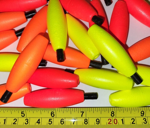 24 of the 2 Inch Styrofoam Cigar Shaped Peg Fishing Floats. 2 Inch Length,  Choose Bright Red, Bright Orange, Bright Yellow or Assorted. 
