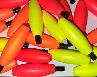 24 of the HUSKY 1.5 inch Length, Fishing Float, Peg with holes, choose Bright Yellow or Bright Red Styrofoam Fishing Floats.