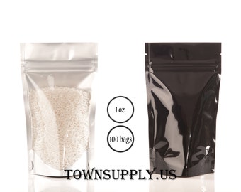 May include: Two stand-up pouches, one silver and one black, each with a clear front window. The silver pouch is filled with white rice. Text in the center reads 1 oz. and 100 bags. The text TOWNSUPPLY.US is printed at the bottom of the image.
